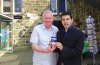 Otley Green Fair 2019. Alex Sobel MP and Ray Georgsson Leader of the Otley Council holding reusable coffee mugs at the Green Fair 2018. 